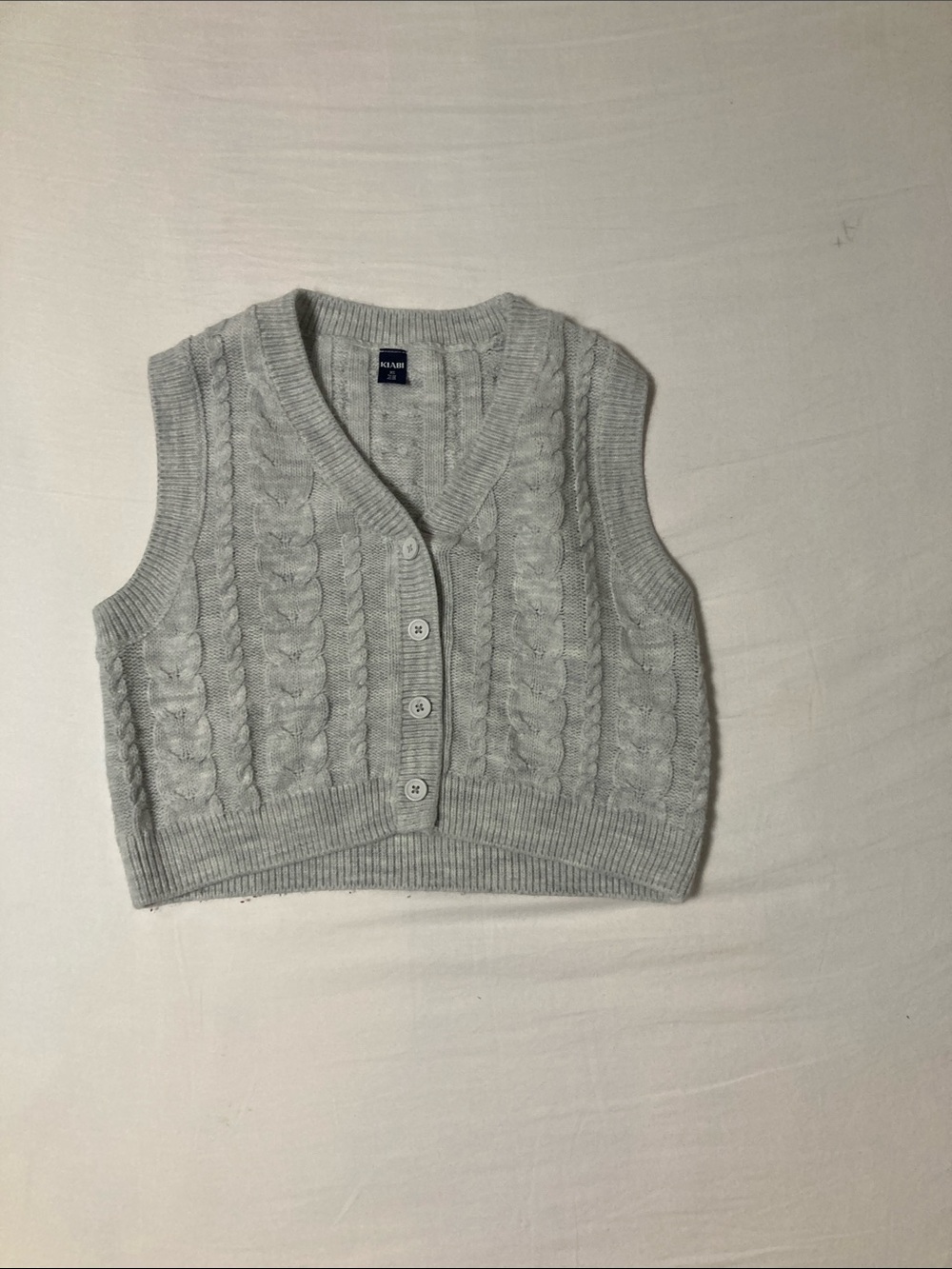 Cable Knit Button-Front Sweater Vest in Light Gray